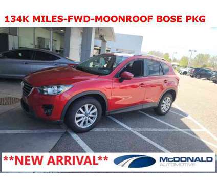 2016 Mazda CX-5 Touring is a Red 2016 Mazda CX-5 Touring SUV in Littleton CO