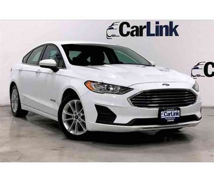 2019 Ford Fusion Hybrid SE is a White 2019 Ford Fusion Hybrid SE Hybrid in Morristown NJ
