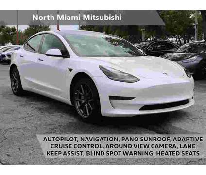 2023 Tesla Model 3 Base is a White 2023 Tesla Model 3 Sedan in Miami FL