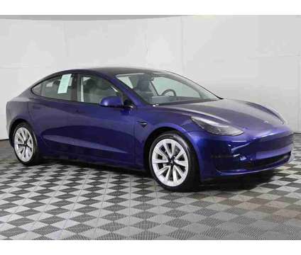 2022 Tesla Model 3 Long Range is a Blue 2022 Tesla Model 3 Long Range Sedan in Bedford OH