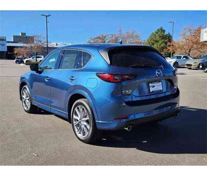 2024 Mazda CX-5 2.5 S Premium Package is a Blue 2024 Mazda CX-5 SUV in Littleton CO