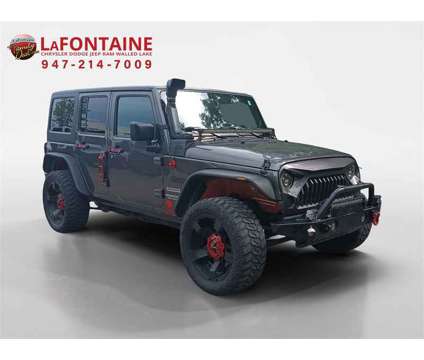 2017 Jeep Wrangler Unlimited Sport is a Grey 2017 Jeep Wrangler Unlimited SUV in Walled Lake MI