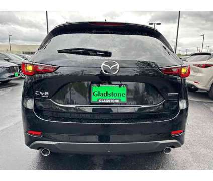 2024 Mazda CX-5 2.5 S Premium Plus Package is a Black 2024 Mazda CX-5 SUV in Gladstone OR