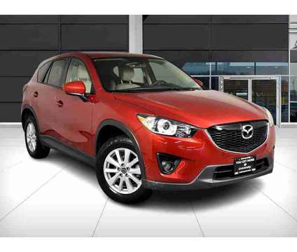 2014 Mazda CX-5 Touring is a Red 2014 Mazda CX-5 Touring SUV in Seattle WA