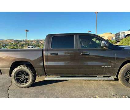 2019 Ram 1500 Big Horn/Lone Star is a Brown 2019 RAM 1500 Model Big Horn Truck in Saint George UT