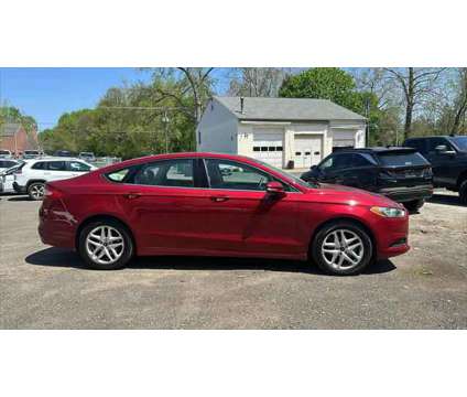 2013 Ford Fusion SE is a Red 2013 Ford Fusion SE Sedan in Danbury CT