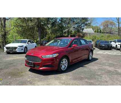 2013 Ford Fusion SE is a Red 2013 Ford Fusion SE Sedan in Danbury CT