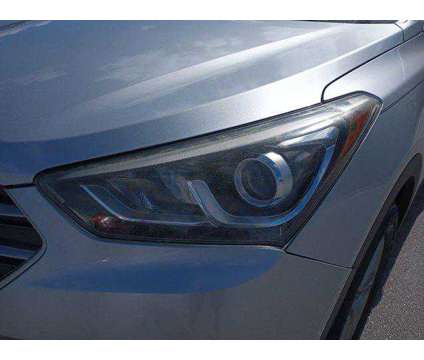 2017 Hyundai Santa Fe Sport 2.4L is a Silver 2017 Hyundai Santa Fe Sport 2.4L SUV in Leesburg FL