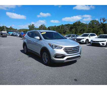 2017 Hyundai Santa Fe Sport 2.4L is a Silver 2017 Hyundai Santa Fe Sport 2.4L SUV in Leesburg FL