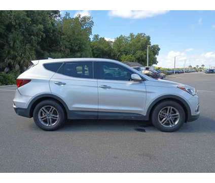 2017 Hyundai Santa Fe Sport 2.4L is a Silver 2017 Hyundai Santa Fe Sport 2.4L SUV in Leesburg FL