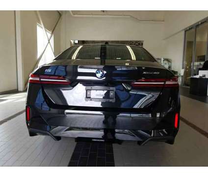 2025 BMW i5 xDrive40 is a Black 2025 Sedan in Westbrook ME