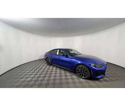 2024 BMW i4 eDrive40 is a Blue 2024 Sedan in Freeport NY