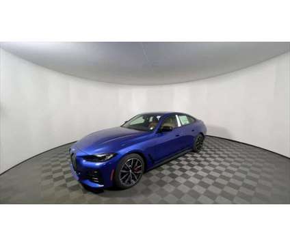 2024 BMW i4 eDrive40 is a Blue 2024 Sedan in Freeport NY