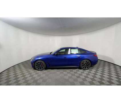 2024 BMW i4 eDrive40 is a Blue 2024 Sedan in Freeport NY