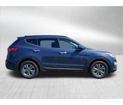 2015 Hyundai Santa Fe Sport 2.4L is a Blue 2015 Hyundai Santa Fe Sport 2.4L Car for Sale in Burnsville MN