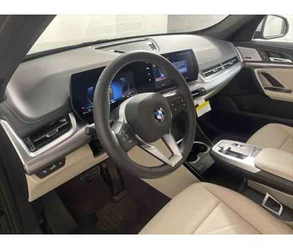 2024 BMW X1 xDrive28i is a Green 2024 BMW X1 xDrive 28i SUV in Freeport NY