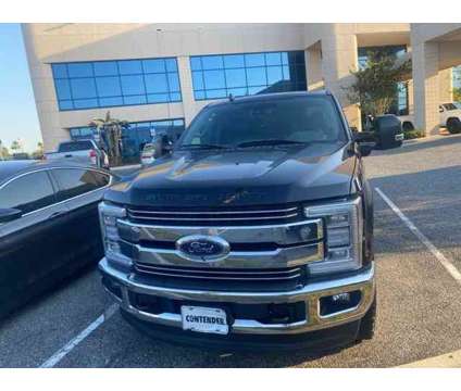 2019 Ford F-250SD Lariat is a Black 2019 Ford F-250 Car for Sale in Orlando FL