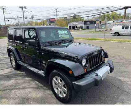 2013 Jeep Wrangler for sale is a Black 2013 Jeep Wrangler Car for Sale in Bridgeport CT