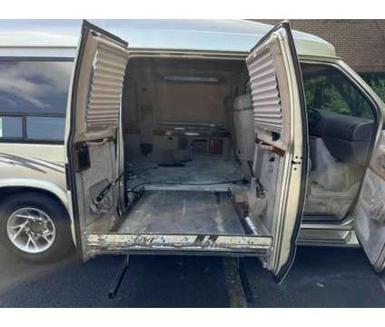 1999 Ford Econoline E250 Cargo for sale is a Gold 1999 Ford Econoline E-250 Car for Sale in Duluth GA