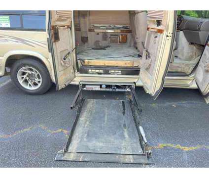 1999 Ford Econoline E250 Cargo for sale is a Gold 1999 Ford Econoline E-250 Car for Sale in Duluth GA