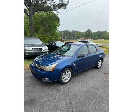 2009 Ford Focus for sale is a Blue 2009 Ford Focus Car for Sale in Coats NC