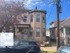 Foreclosure Property: E 22nd St