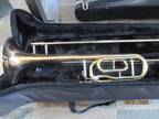 Trigger Trombone with Case and mouthpiece. Large bore.