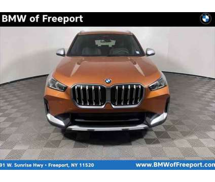 2024 BMW X1 xDrive28i is a Orange 2024 BMW X1 xDrive 28i SUV in Freeport NY