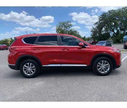 2020 Hyundai Santa Fe SE is a Red 2020 Hyundai Santa Fe SE SUV in New Port Richey FL