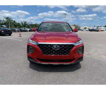 2020 Hyundai Santa Fe SE is a Red 2020 Hyundai Santa Fe SE SUV in New Port Richey FL