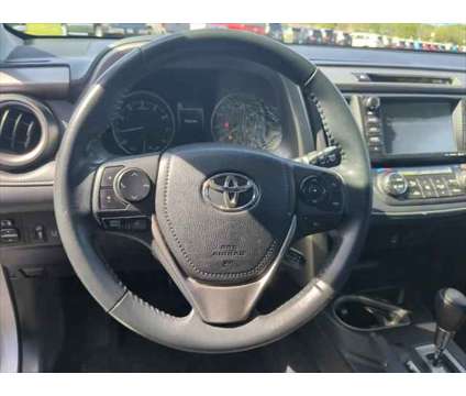 2018 Toyota RAV4 XLE is a 2018 Toyota RAV4 XLE SUV in Dubuque IA