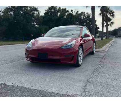 2022 Tesla Model 3 for sale is a Red 2022 Tesla Model 3 Car for Sale in Orlando FL