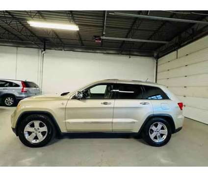 2011 Jeep Grand Cherokee for sale is a Gold 2011 Jeep grand cherokee Car for Sale in Addison IL
