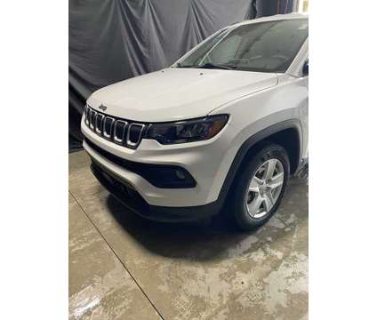 2022UsedJeepUsedCompassUsed4x4 is a White 2022 Jeep Compass Car for Sale in Brunswick OH
