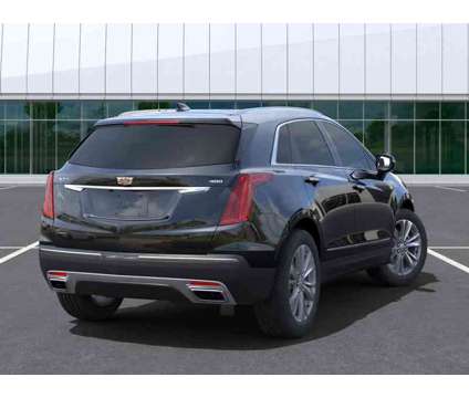 2024NewCadillacNewXT5New4dr is a Black 2024 Cadillac XT5 Car for Sale in Moline IL