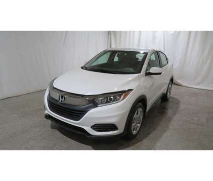 2021UsedHondaUsedHR-VUsed2WD CVT is a Silver, White 2021 Honda HR-V Car for Sale in Brunswick OH