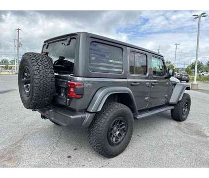 2023 Jeep Wrangler Willys is a Grey 2023 Jeep Wrangler Car for Sale in Southaven MS