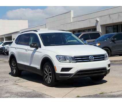 2019 Volkswagen Tiguan SE is a White 2019 Volkswagen Tiguan SE Car for Sale in Houston TX