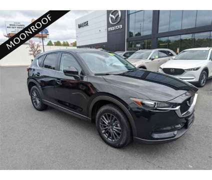 2021 Mazda CX-5 Touring is a Black 2021 Mazda CX-5 Touring Car for Sale in Springfield MA