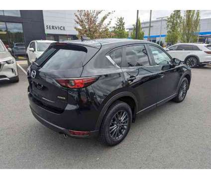 2021 Mazda CX-5 Touring is a Black 2021 Mazda CX-5 Touring Car for Sale in Springfield MA