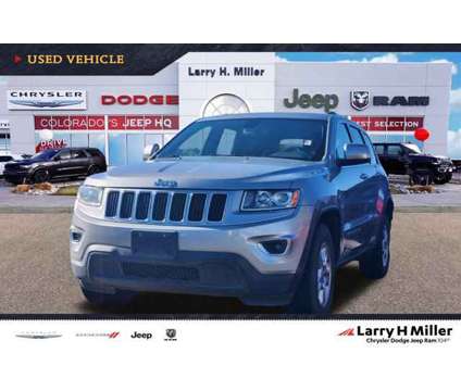 2014 Jeep Grand Cherokee Laredo is a Silver 2014 Jeep grand cherokee Laredo Car for Sale in Denver CO