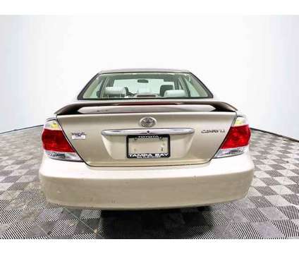 2006 Toyota Camry LE is a Tan 2006 Toyota Camry LE Car for Sale in Tampa FL