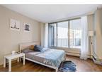 Bright bedroom next to Commercial-Broadway Station