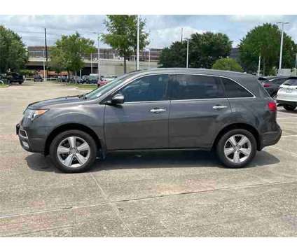 2012 Acura MDX Technology SH-AWD is a Grey 2012 Acura MDX Technology SUV in Houston TX