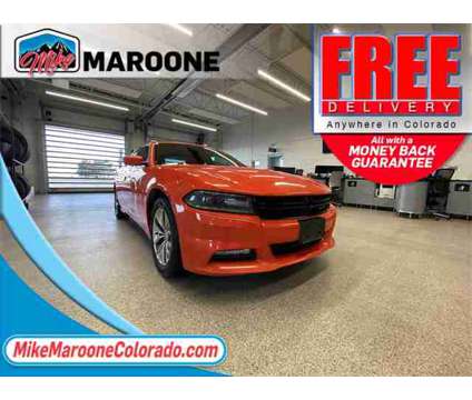 2016 Dodge Charger SXT is a Gold 2016 Dodge Charger SXT Sedan in Colorado Springs CO