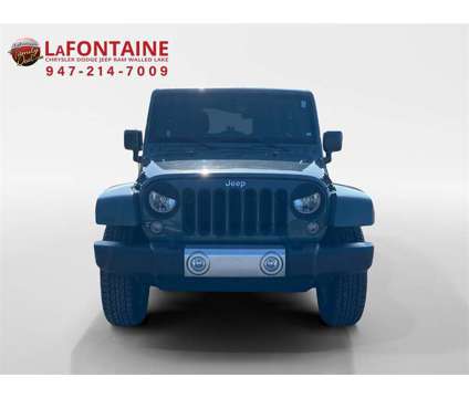 2014 Jeep Wrangler Unlimited Sahara is a 2014 Jeep Wrangler Unlimited Sahara SUV in Walled Lake MI