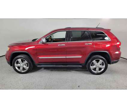 2013 Jeep Grand Cherokee Overland is a Red 2013 Jeep grand cherokee Overland SUV in Las Vegas NV