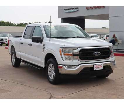 2021 Ford F-150 XLT is a White 2021 Ford F-150 XLT Truck in Bay City TX