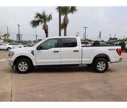 2021 Ford F-150 XLT is a White 2021 Ford F-150 XLT Truck in Bay City TX