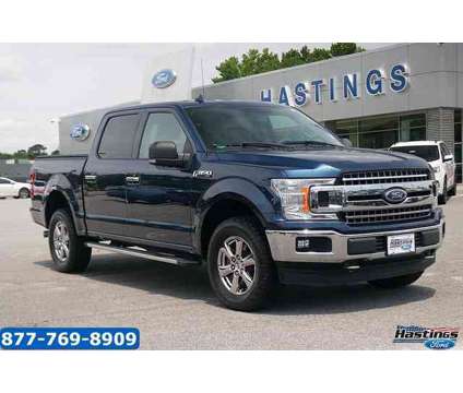 2018 Ford F-150 XLT is a Blue 2018 Ford F-150 XLT Truck in Greenville NC